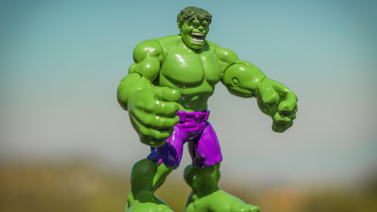 Marvel Hulk action figure standing on gray surface