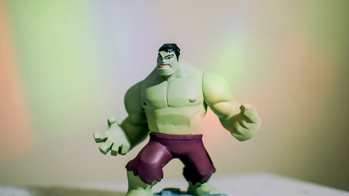 green and black action figure