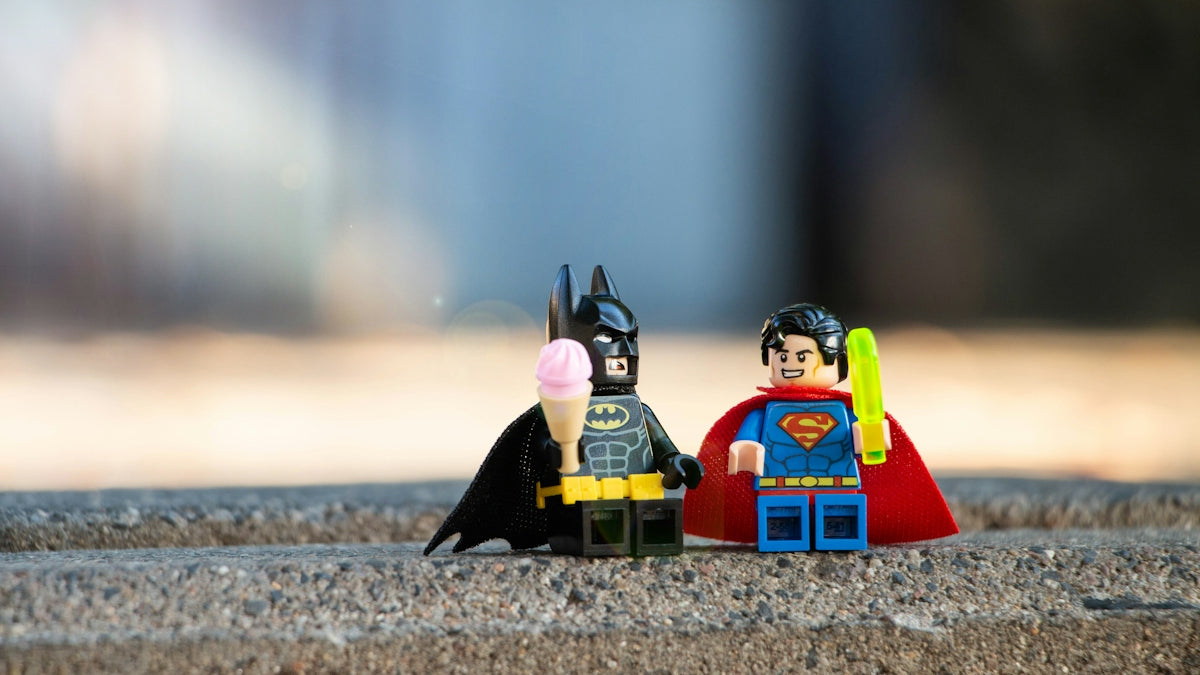lego mini figure on brown sand