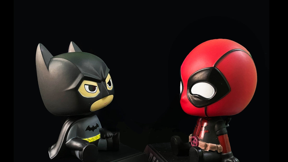red and black batman action figure