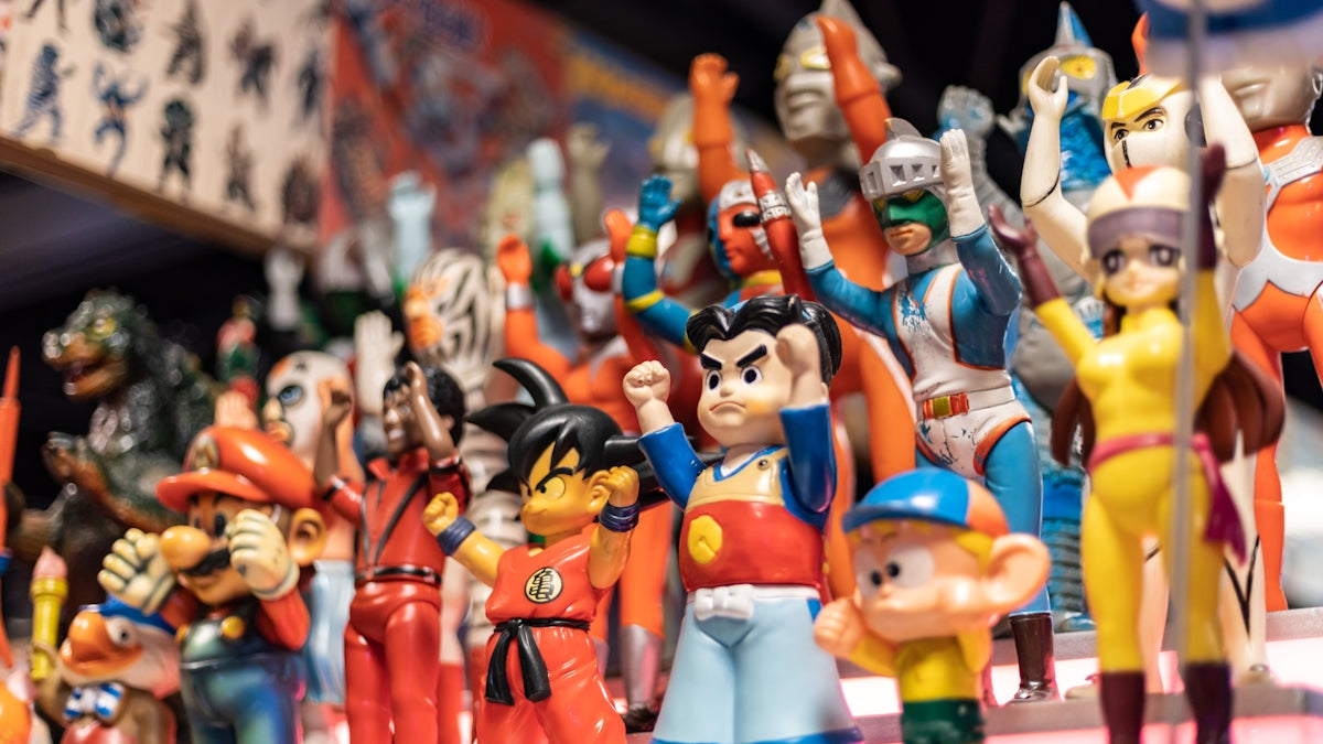 A collection of vintage superhero toys.