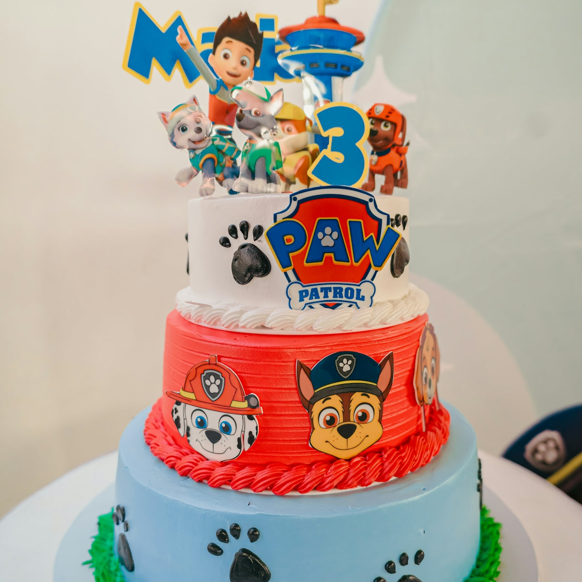 Paw patrol themed three-tiered birthday cake